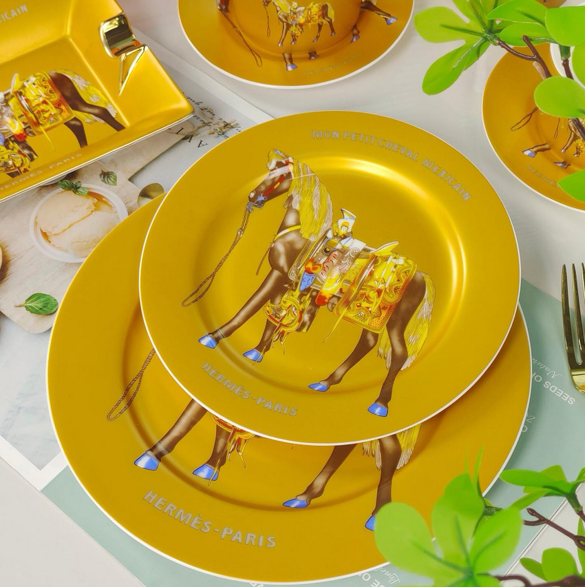 Hermes set of two golden plates with horse